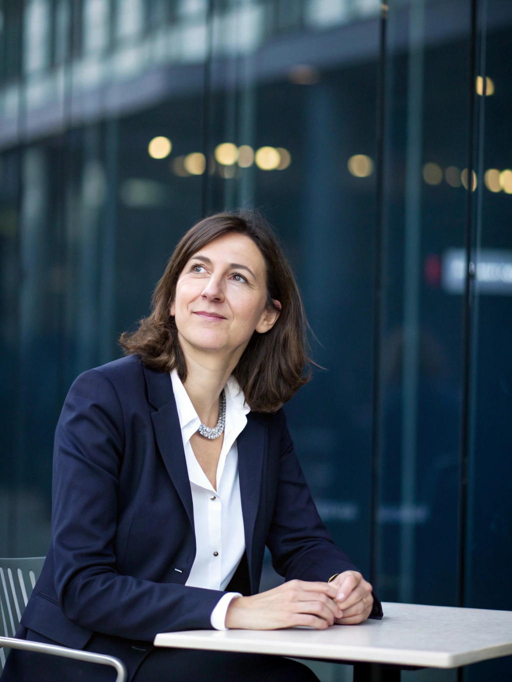 Elegant woman leader in a professional setting with soft warm lighting